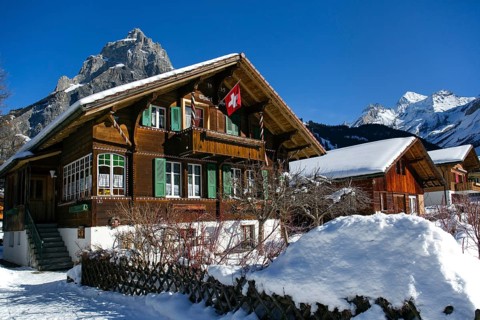 Chalet with a Swiss flag