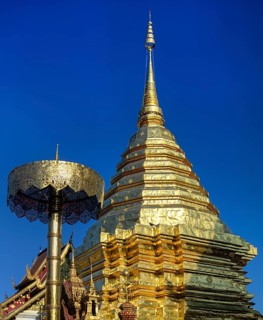Wat Phra That Doi Suthep mountain temple with golden chedi with a golden umbrella