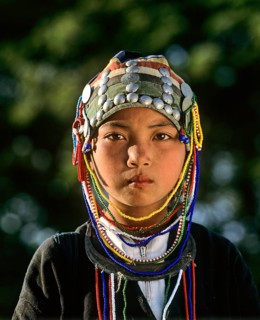Akha girl with traditional clothing and headdress