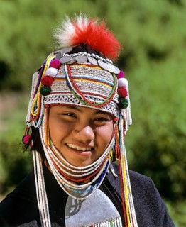 Akha girl with traditional clothing and headdress