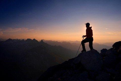 Mountaineer on Grosser Krottenkopf Mountain at dusk