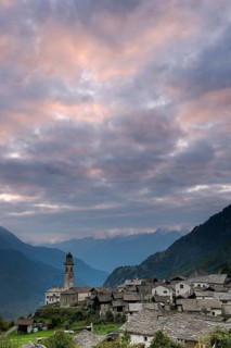 Village with old stone houses at sunset