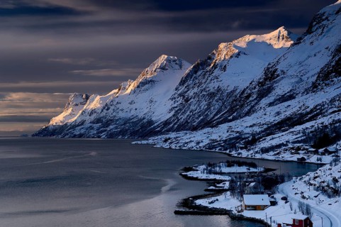 Fjord with small town in the evening light