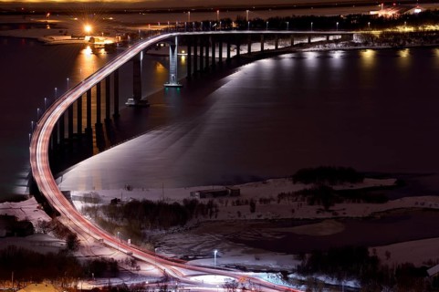 Bridge over fjord at night