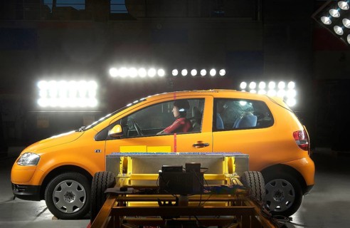 Crash test dummies in a car behind a battering ram