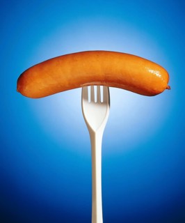 Sausage on a plastic fork