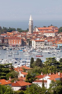 Marina on the Adriatic coast with the historic town centre of Izola