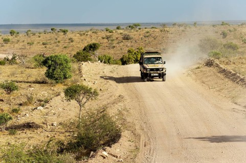 Off-road vehicle on dirt road