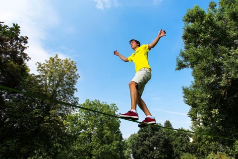 Athlete balancing on a slackline