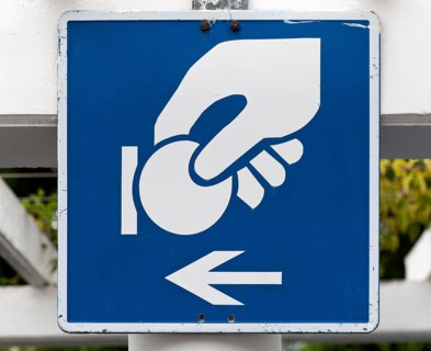 Sign to the parking ticket machine for paid parking