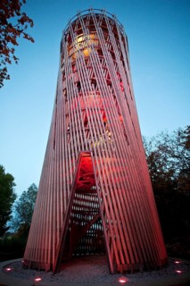 Illuminated Juebergturm tower during the Lichtgarten Sauerlandpark event
