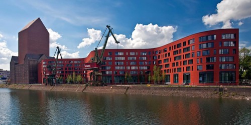 NRW Archive building with two cranes in the inner harbour