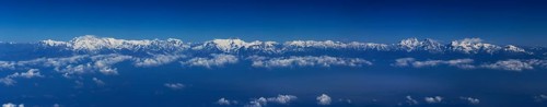 Mountain range of the Himalayas from a plane