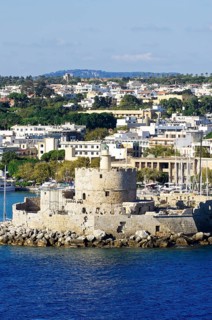 Harbour entrance of Rhodes with the fortified tower of Agios Nikolaos