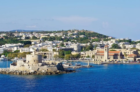 Harbour entrance of Rhodes with the fortified tower of Agios Nikolaos