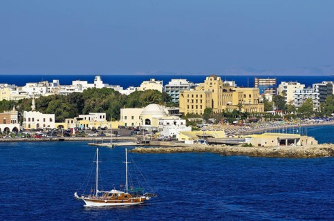 Harbour entrance of Rhodes in front of the casino and other buildings