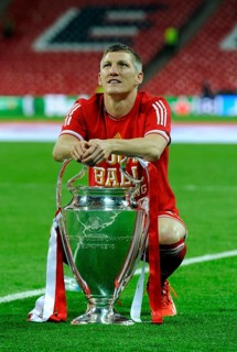 Bastian Schweinsteiger with the trophy