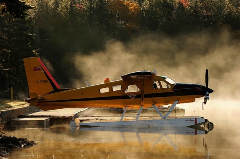 Seaplane on Smoke Lake in the morning mist