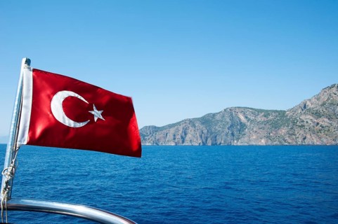 Turkish flag on a cruise ship in the Turkish Aegean Sea