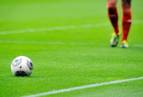 Bundesliga football 'Torfabrik' and legs of a player