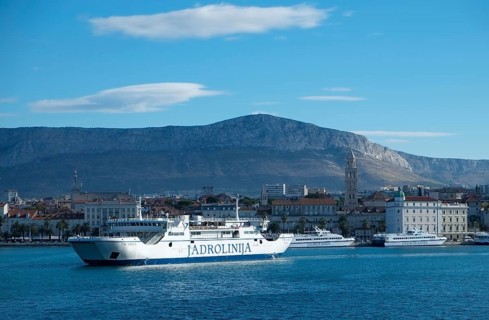 Ferry in the harbour in front of the historic town centre