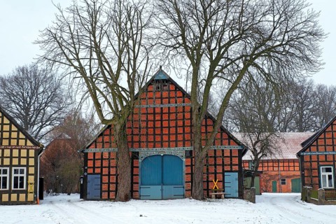 Historic Lower Saxon half-timbered houses in rundling village of Satemin