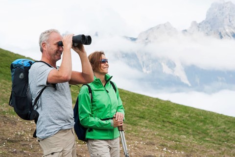 Couple enjoying the misty view while hiking