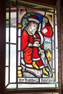 Stained glass window depicting Walther von der Vogelweide