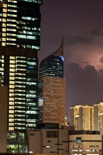 High-rise buildings in front of storm clouds