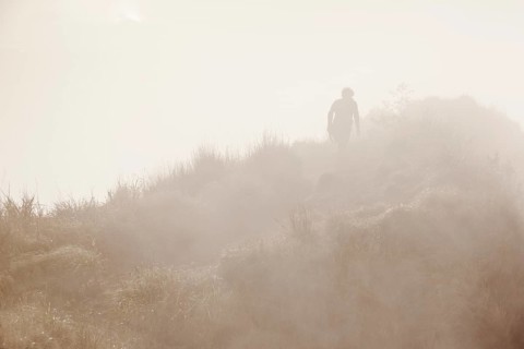 Hiker in the mist on Gunung Agung volcano