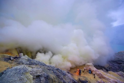 Sulfur miners mining sulfur at Ijen Volcano