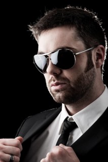 Man wearing sunglasses with stubble