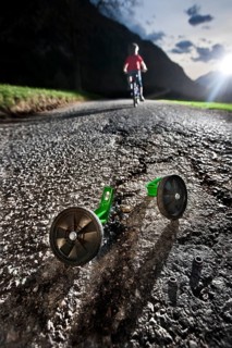 Boy riding a bicycle for the first time without training wheels