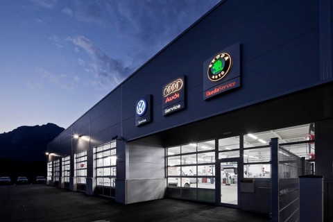 Car repair shop at dusk