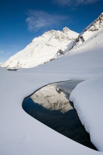 The Hoher Riffler reflected in a lake