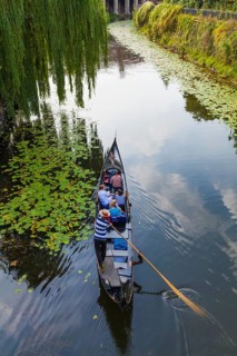 Gondolier in a gondola on the Karl-Heine Canal