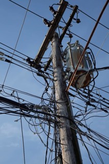 Electrical cables and telephone wires on a power pole