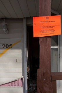 Unsafe Structure Notice on house severely damaged by Hurricane Sandy
