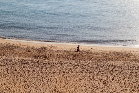 Jogger at the beach