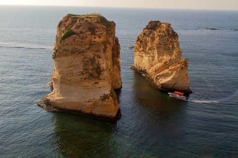 Motorboat between El Rawsheh Rock or Pigeon Rocks