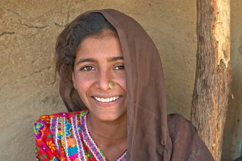 Young Indian woman with a headscarf and nose jewellery