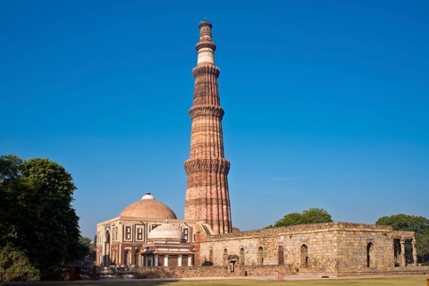 Victory column and minaret of Qutb Minar from the Islamic ruler Qutb-ud-din Aibak and the Quwwat-ul-Islam Masjid Mosque