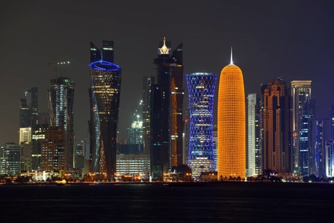 Skyline of Doha at night with the Al Bidda Tower