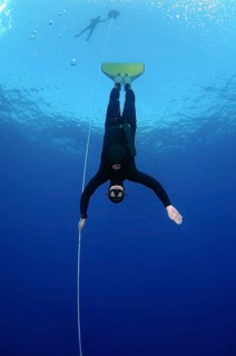 Freediver wearing a monofin