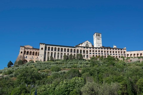 Monastery of St. Clare of Assisi with the Basilica of San Francesco at the foot of Monte Subasio