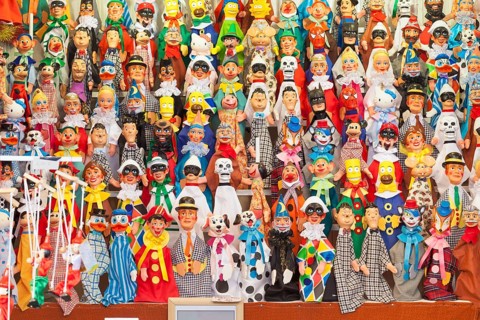 Puppets on display at a market stall in Navona Square