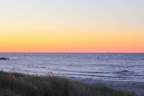 Evening sky on the Baltic Sea on Schoenberger Strand beach