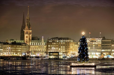 Binnenalster or Inner Alster Lake with a Christmas tree and City Hall