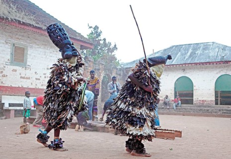 Traditional mask dance with a xylophone and flutes at the Palace of Bafut