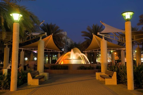 Fountain in a park at dusk